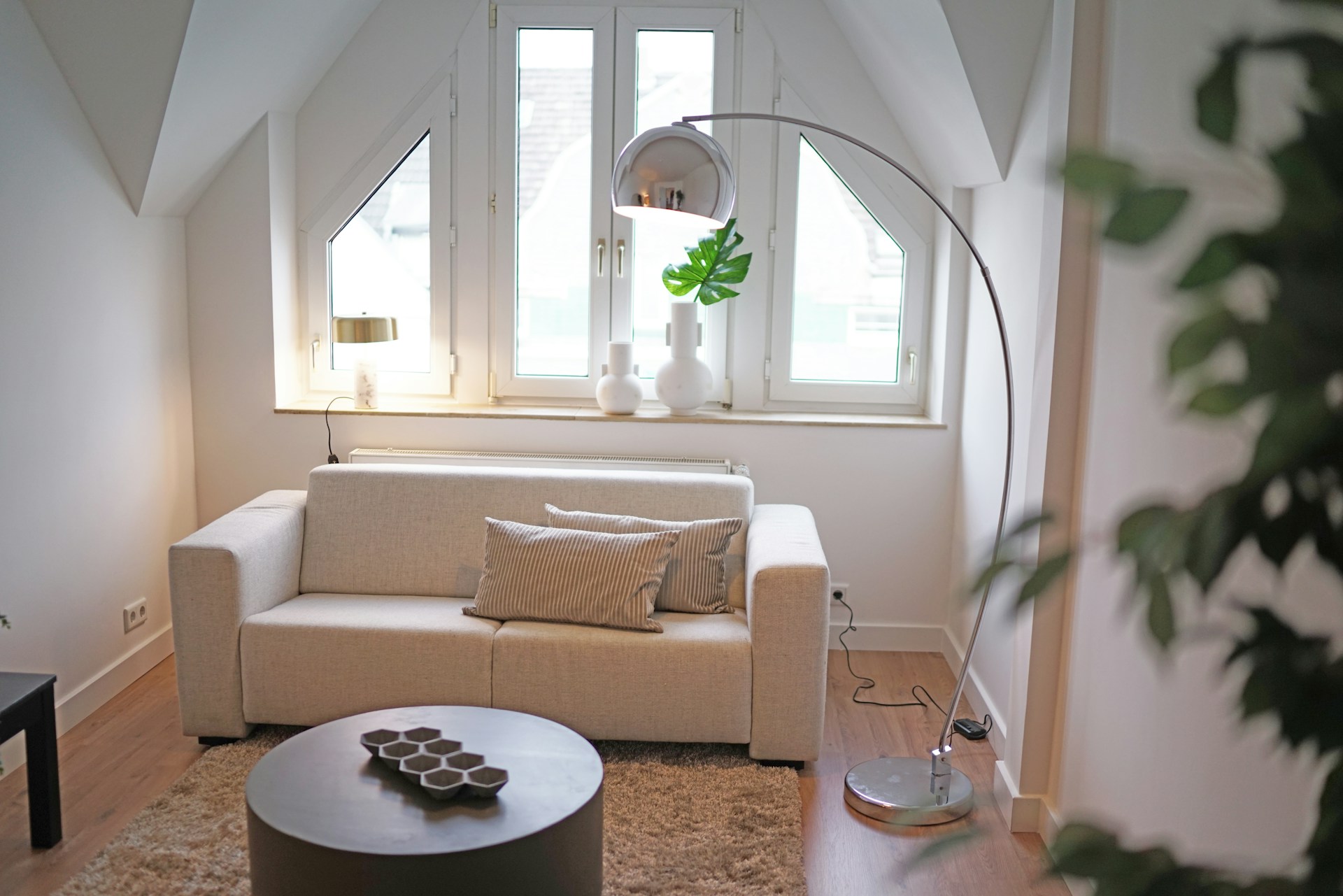 a living room with a couch and a table