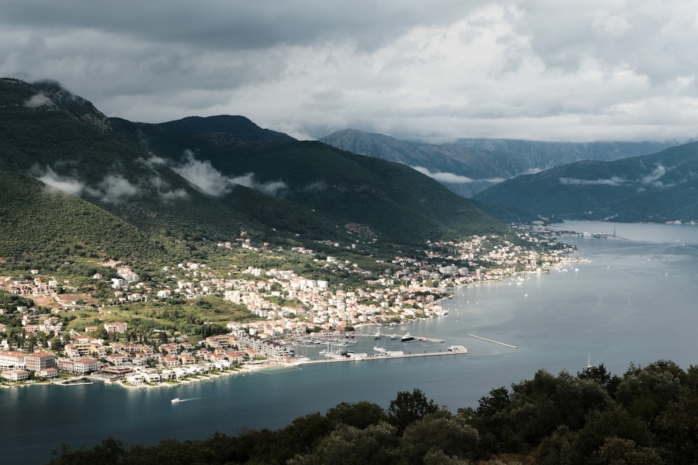 a view of a town and a body of water