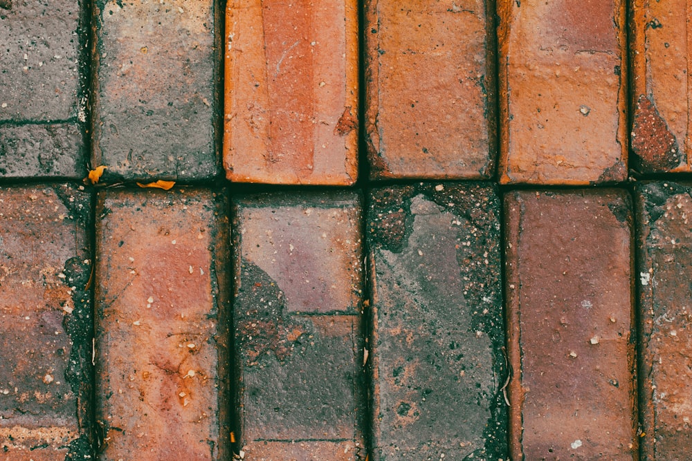 a close up of a brick wall made of bricks