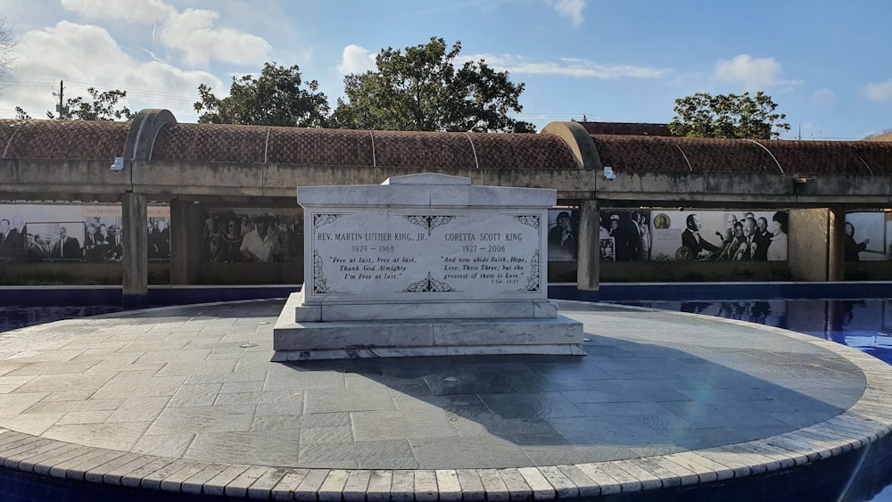 a monument in the middle of a swimming pool