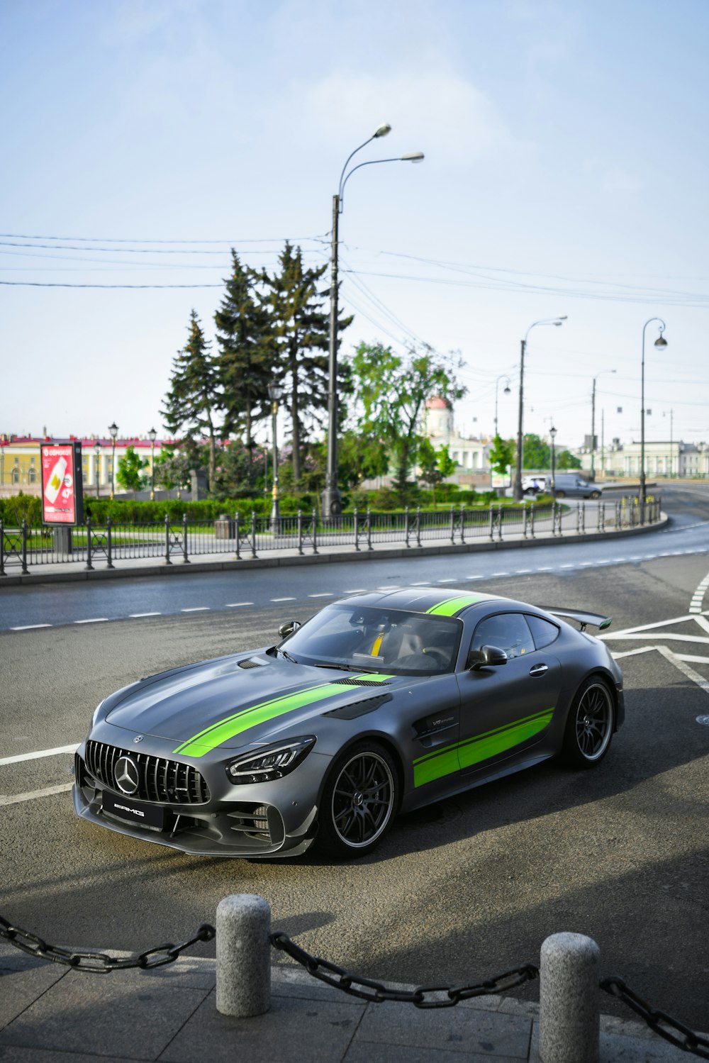 a mercedes amg gt r driving down a street