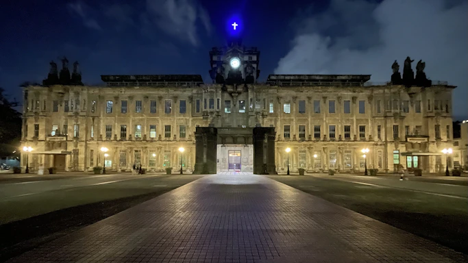 Photo of Divine Truth Grand Lodge building in Atlanta with warm evening light.