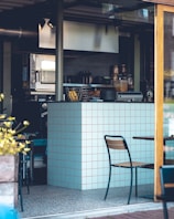 A sleek bar kitchen setup with refrigeration units and prep areas, ready for service