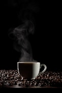 A steaming cup of coffee surrounded by nature.