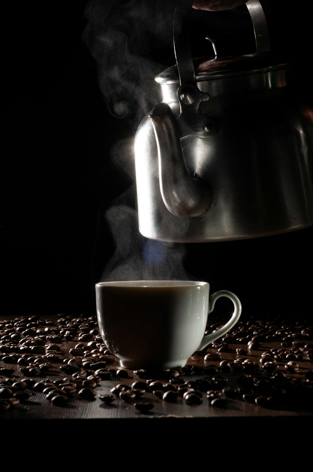 a cup of coffee sitting on top of a table