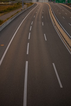 A completed road with clear markings and signage.