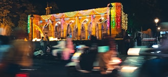 Close-up of a vibrant, illuminated banner on a commercial building.