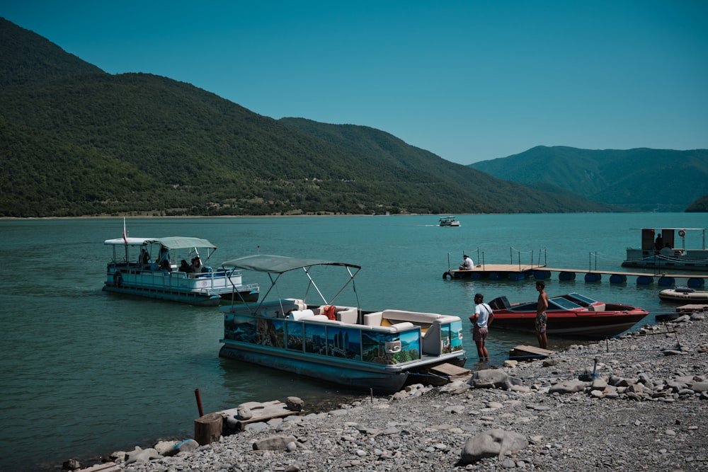 a couple of boats that are sitting in the water