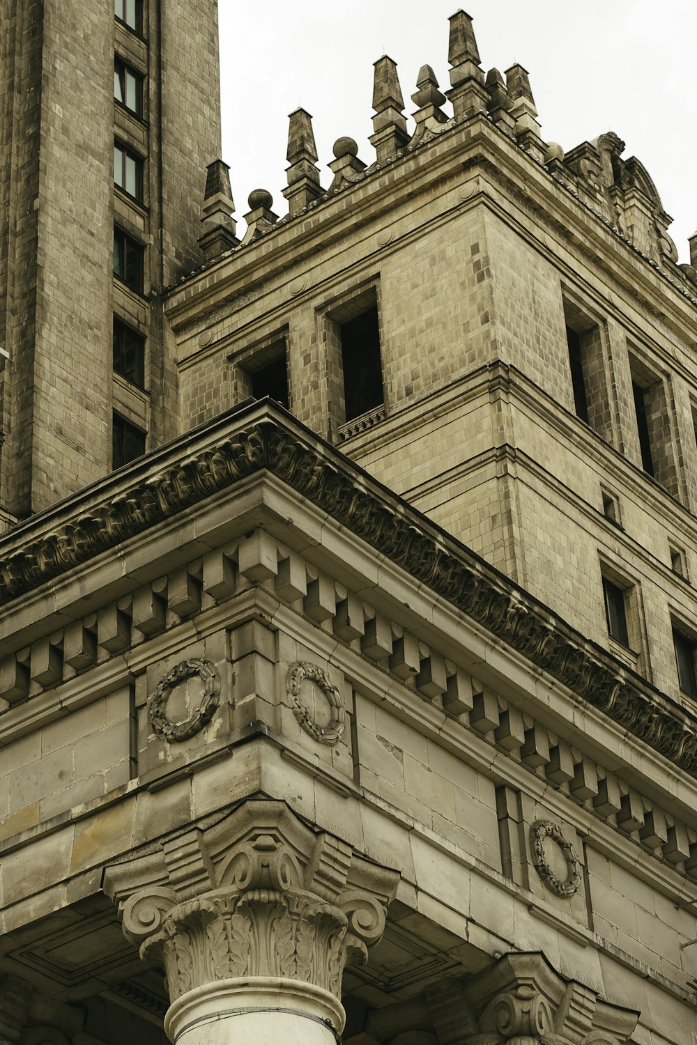 a tall building with a clock on the front of it