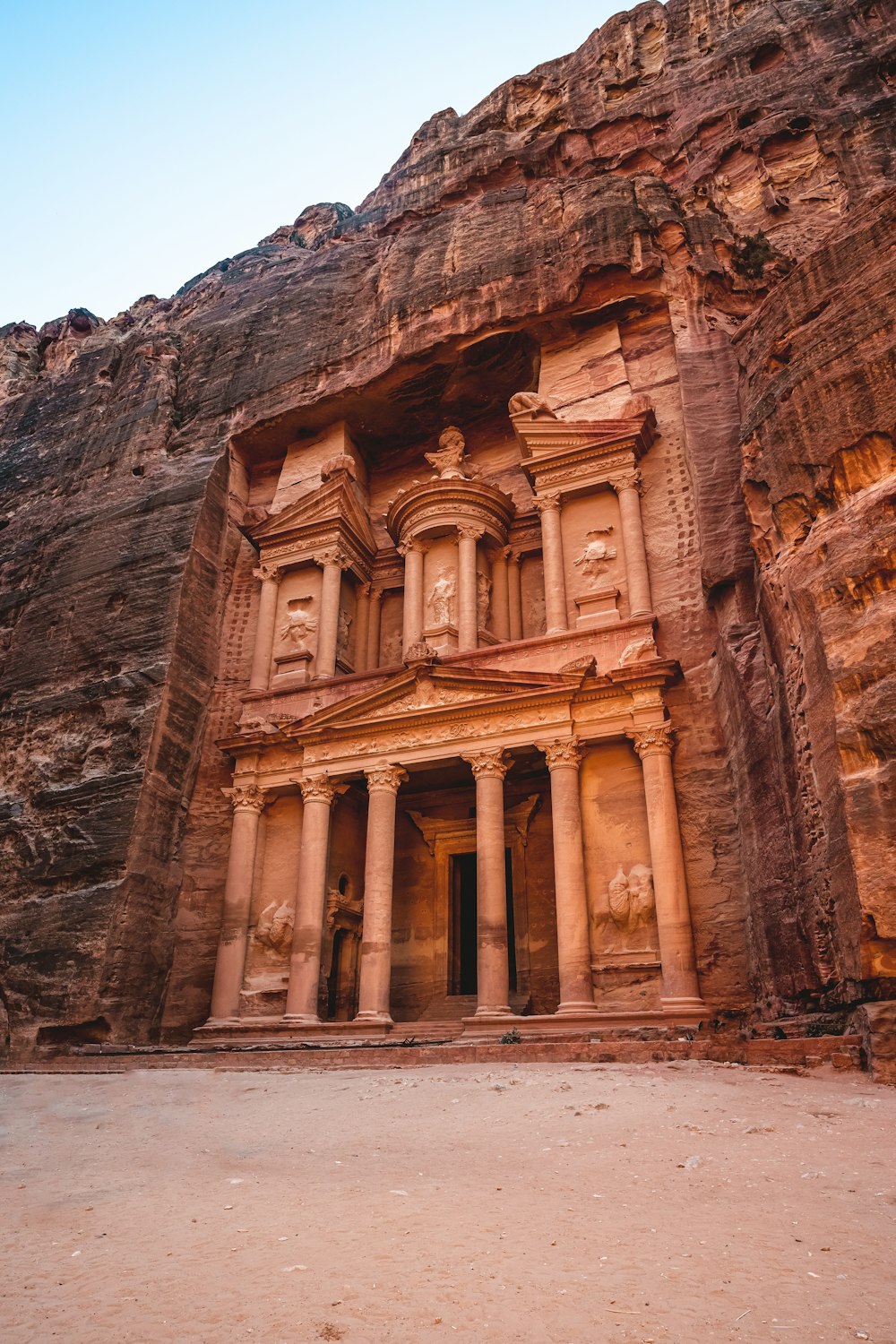 a large building in the middle of a desert