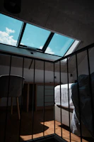 Spacious loft conversion featuring bright skylights and cozy living space.