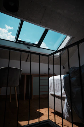 Spacious loft conversion featuring bright skylights and cozy living space.