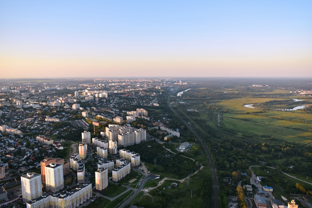 an aerial view of a city with tall buildings