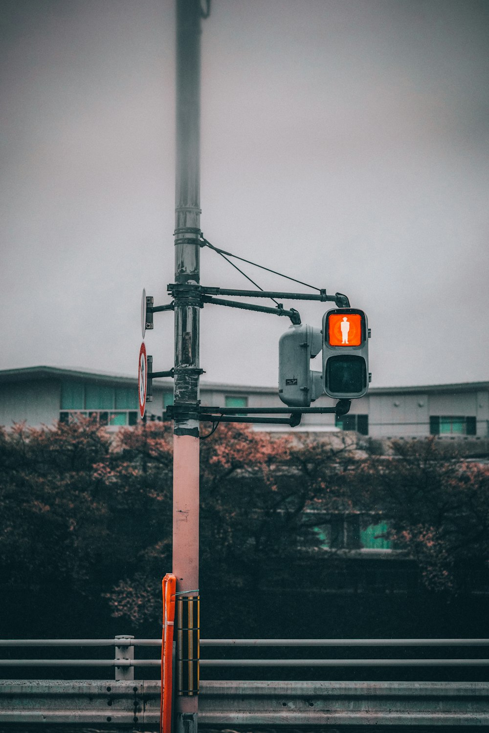 a traffic light sitting on the side of a road