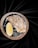 A single oyster on a half shell rests on a bed of ice inside a stone bowl, accompanied by a slice of lemon. The backdrop is a smooth, dark fabric that adds a touch of elegance to the composition.