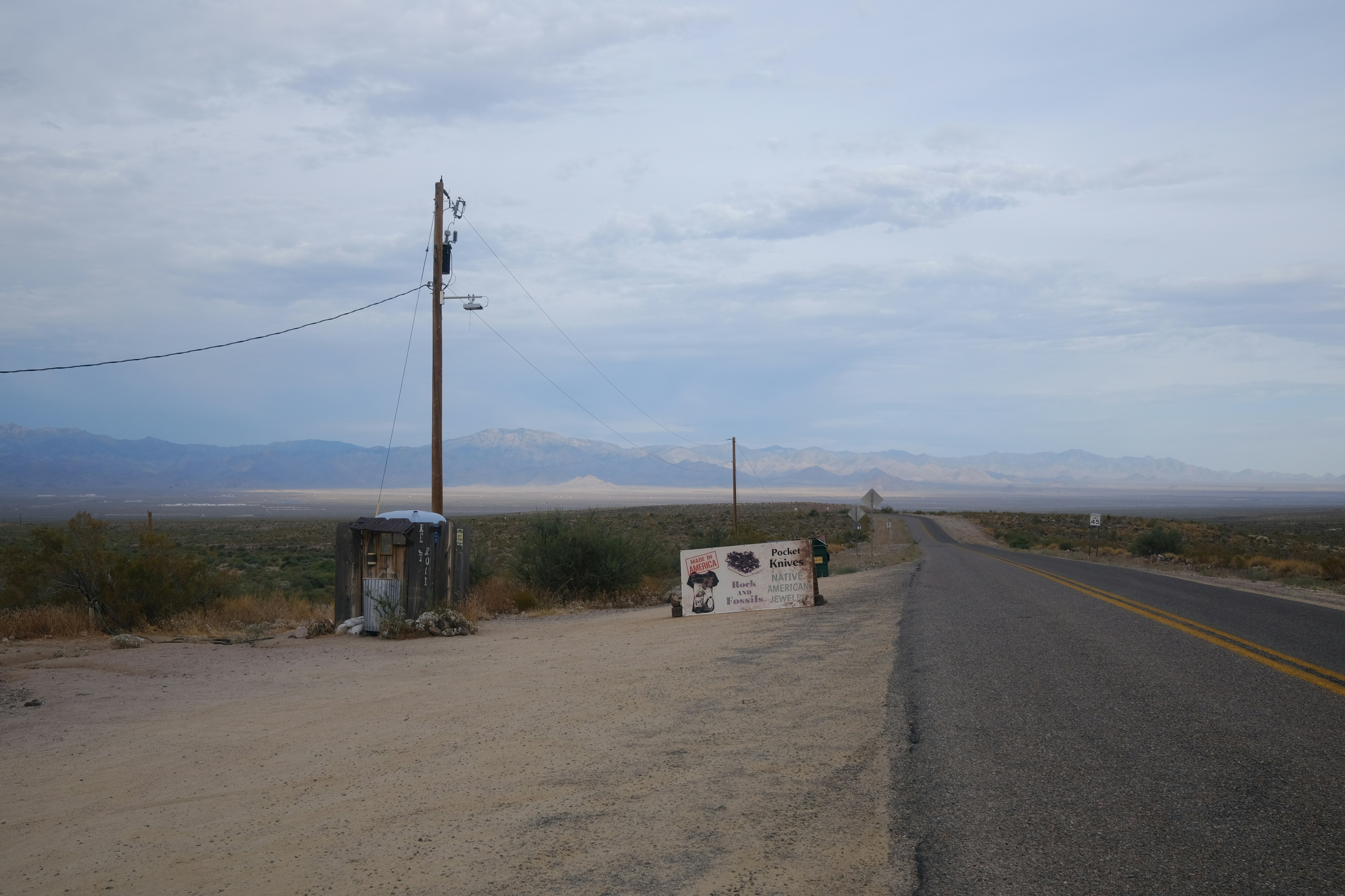 a road with a sign on the side of it
