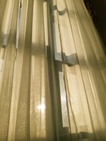 Soft sunlight filtering through curtains in a welcoming therapy space.