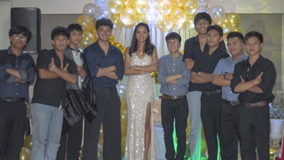 Group photo of celebrium agency team with featured talents at a networking gala.