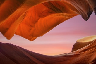 A serene view of the Cuesta rock formations bathed in soft afternoon light.