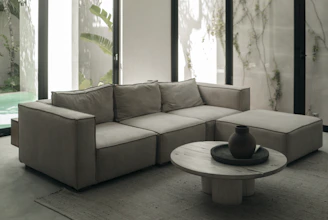 a living room with a couch and a coffee table