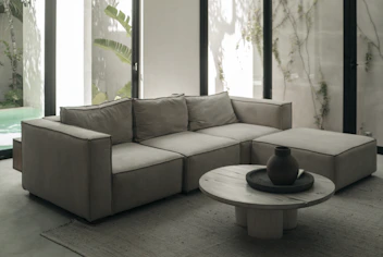 a living room with a couch and a coffee table