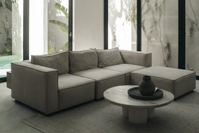 a living room with a couch and a coffee table