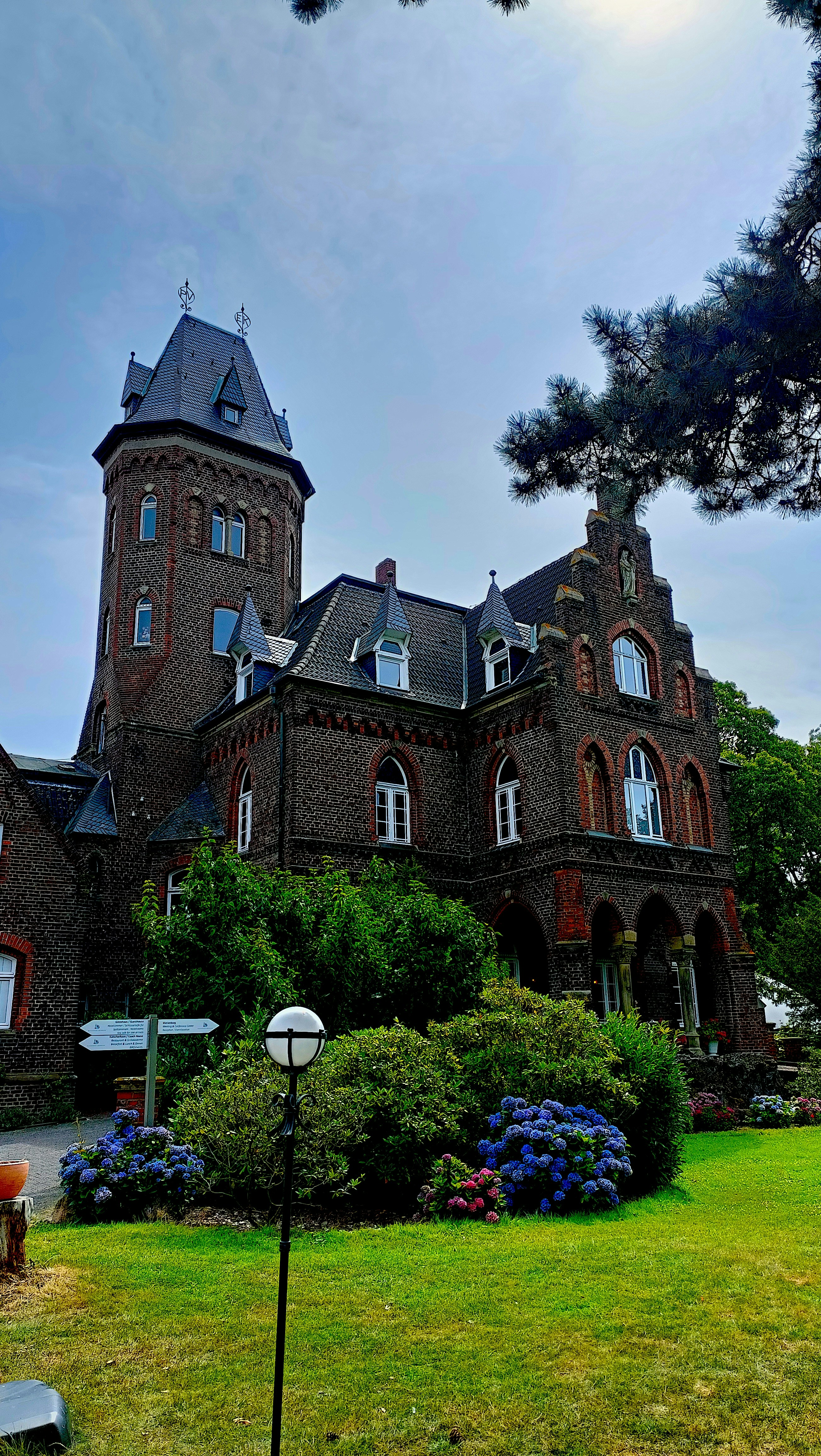 a large brick building with a clock tower