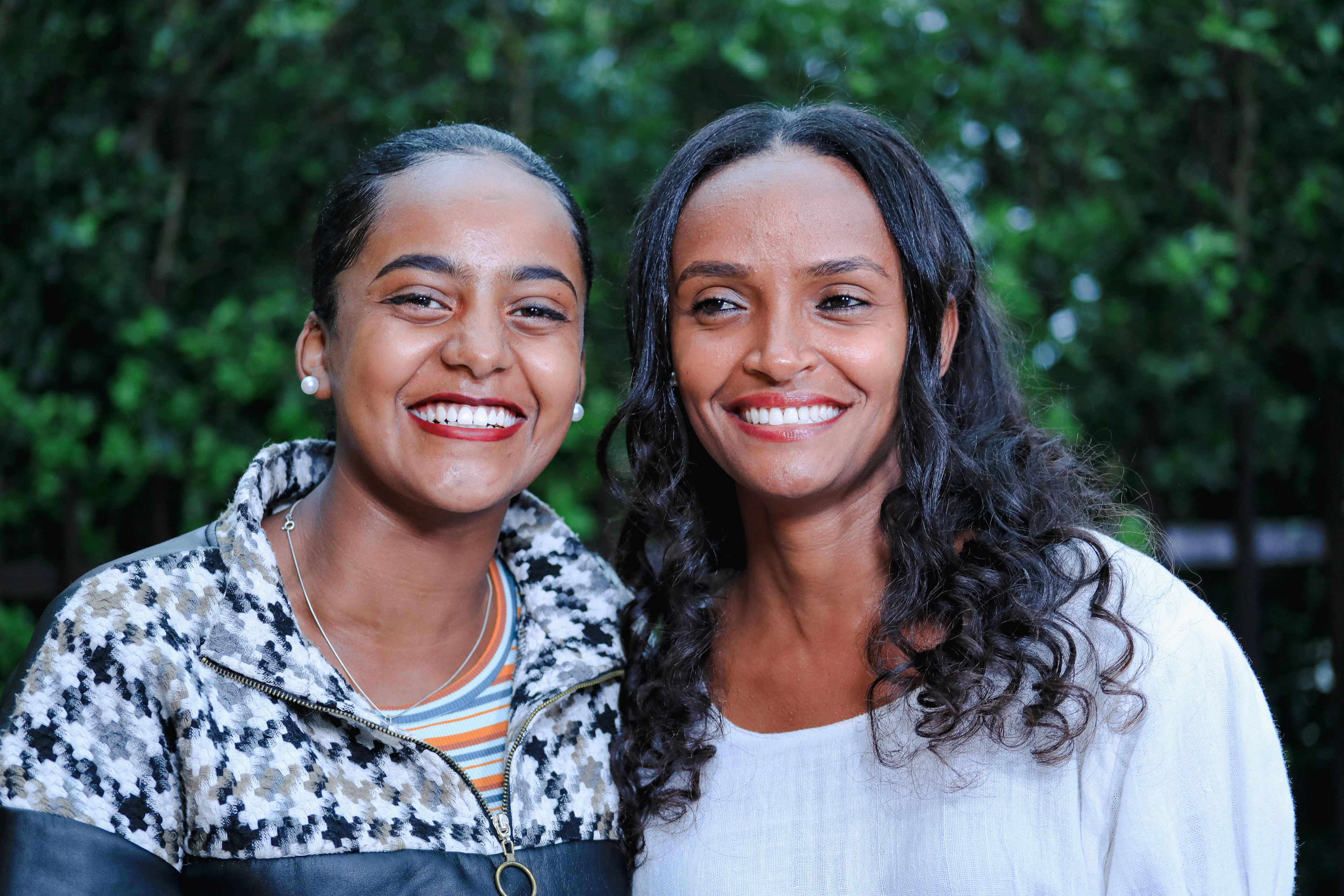 Two women smiling together