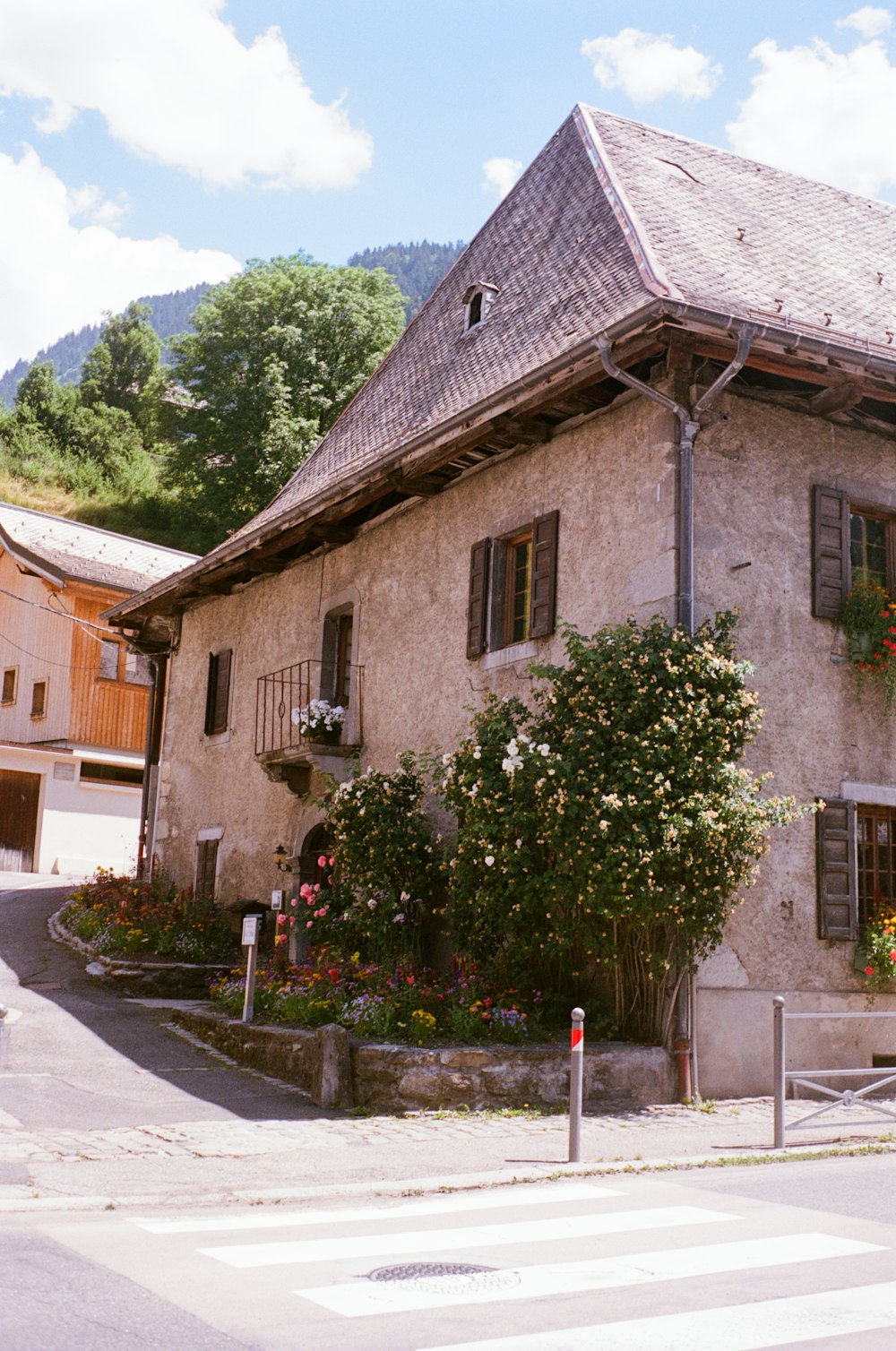 a house with a steeple on the side of it