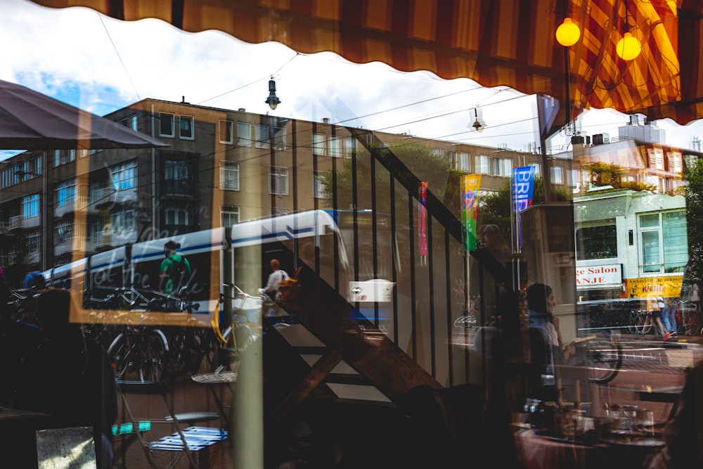 a reflection of a building in a window