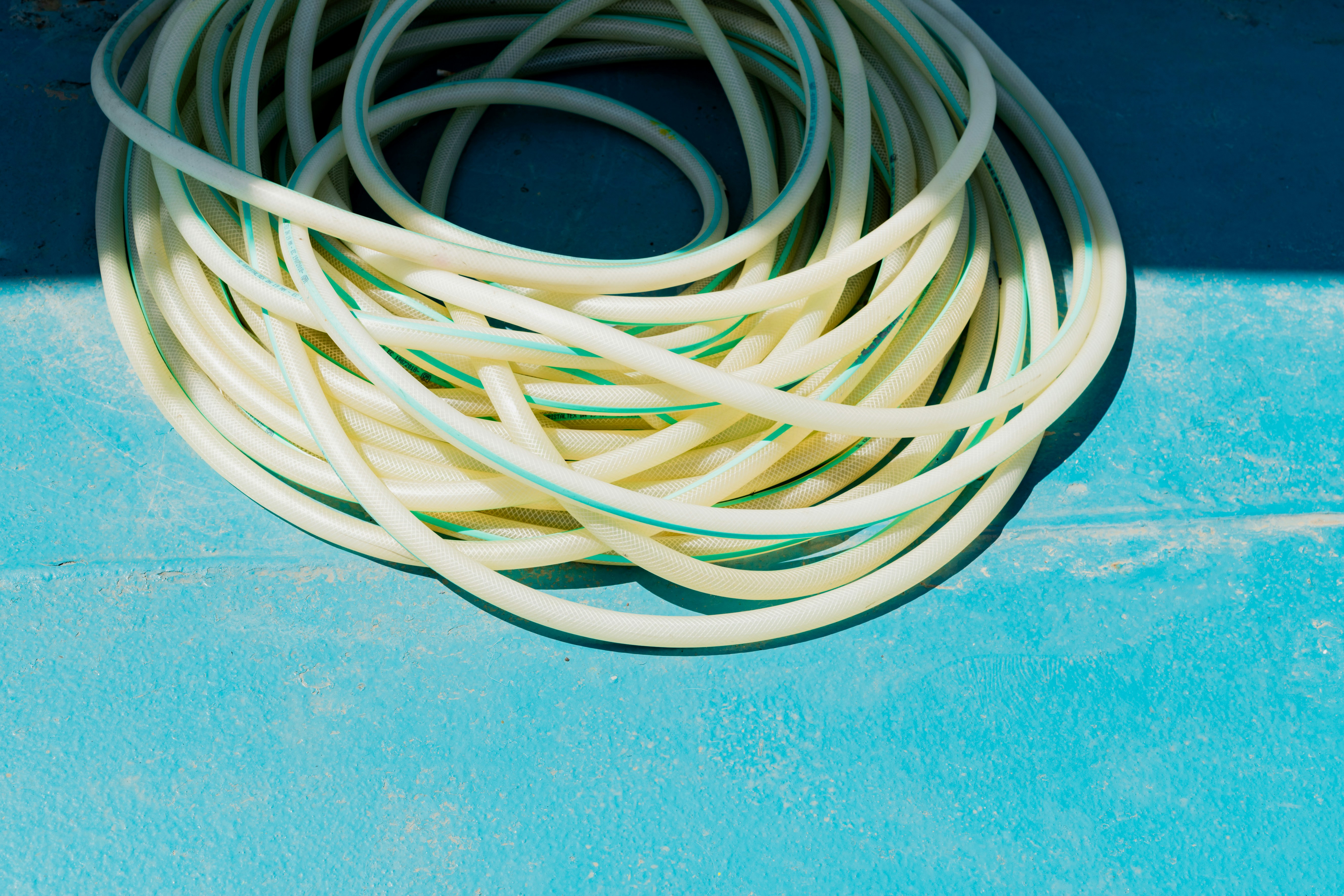 a close up of a bunch of wires on a blue surface
