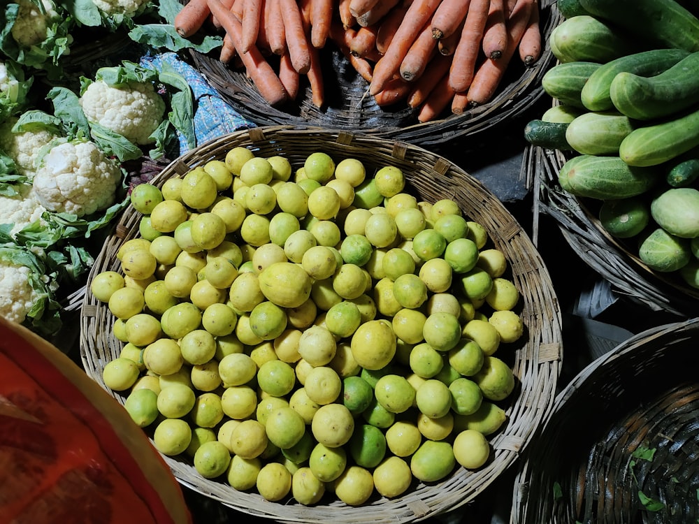 a variety of fruits and vegetables in baskets