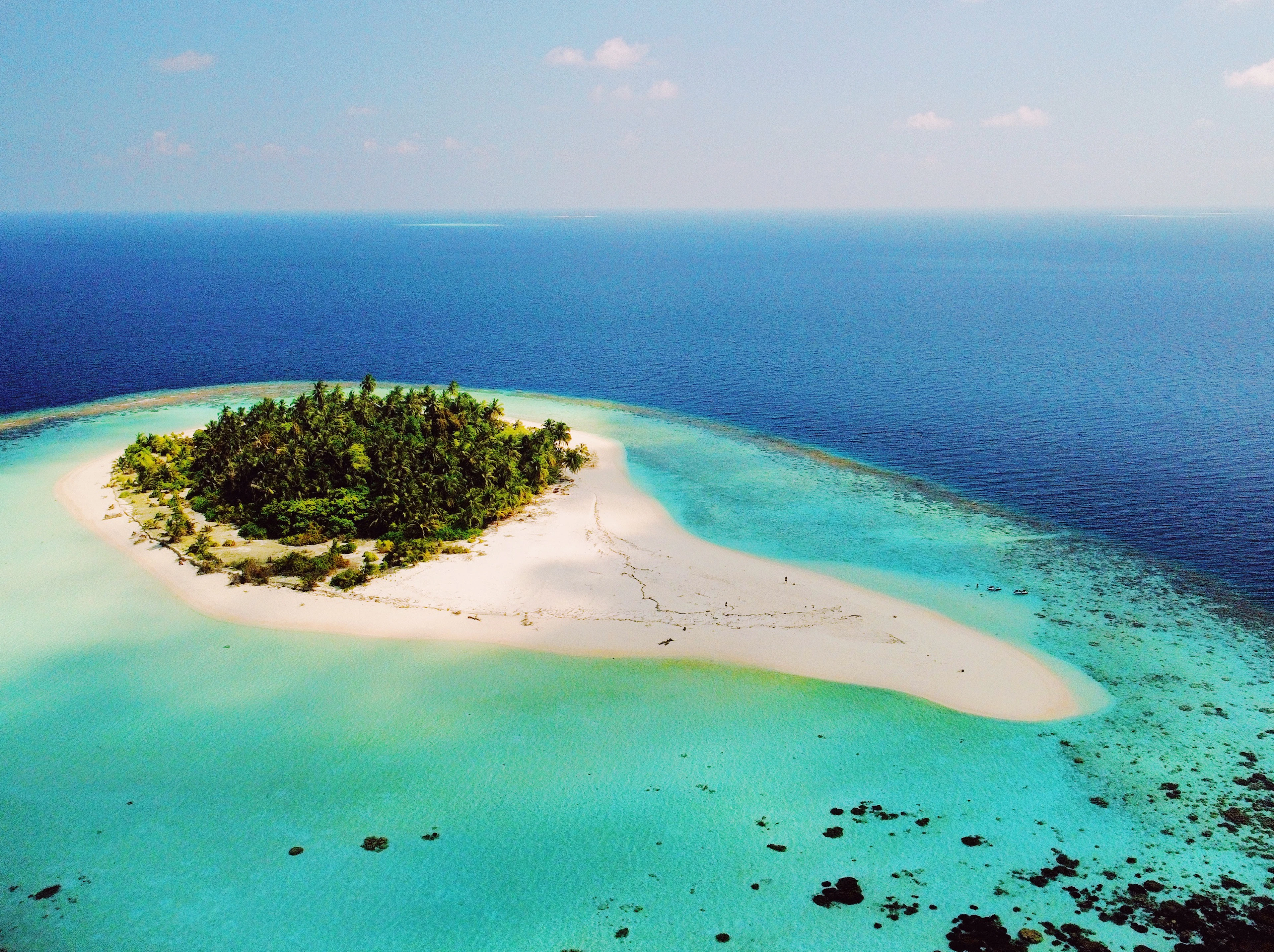 Coral island ringed by a turquoise lagoon