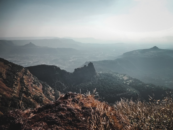 A breathtaking view of the Bhutanese landscape showcasing lush valleys and majestic mountains.