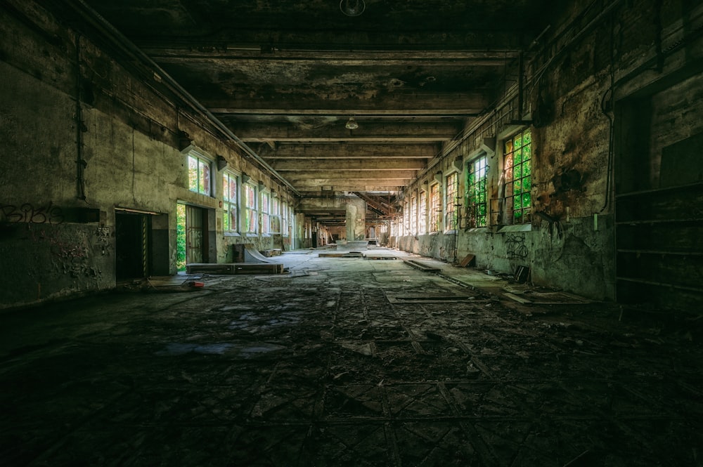 an abandoned building with a lot of windows