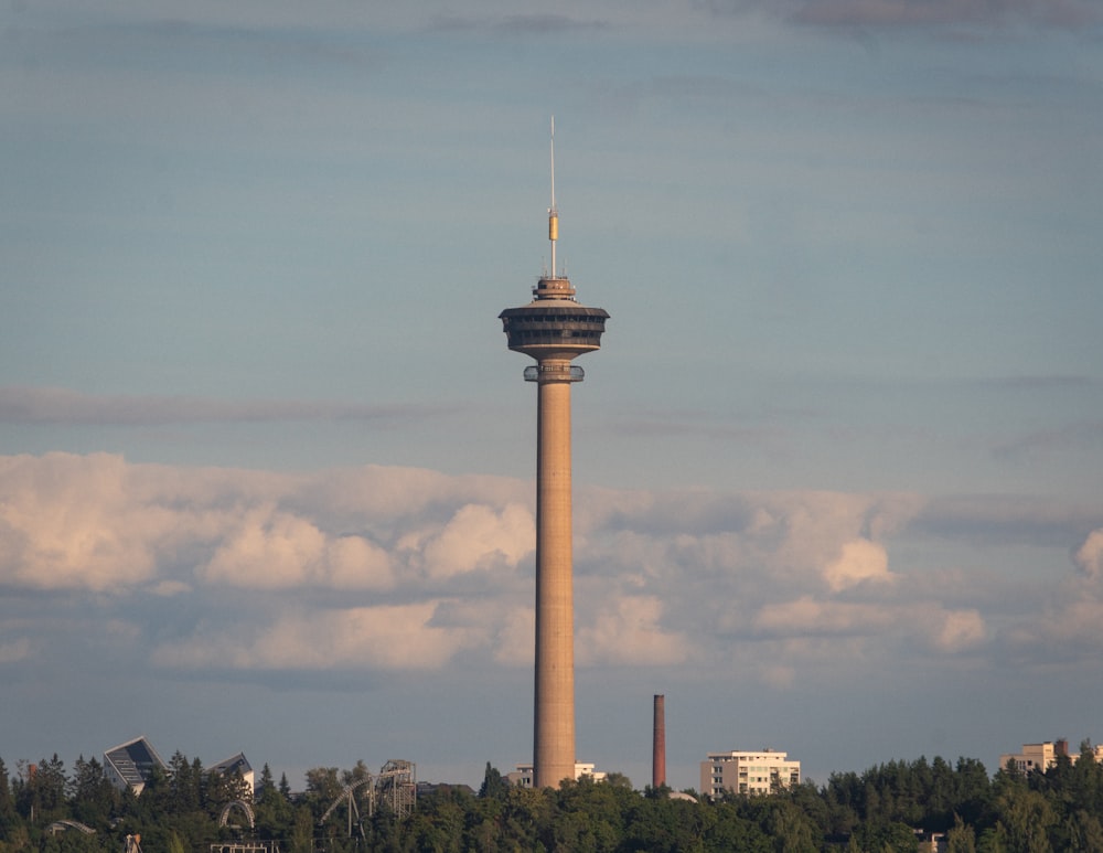 a tall tower in the middle of a city