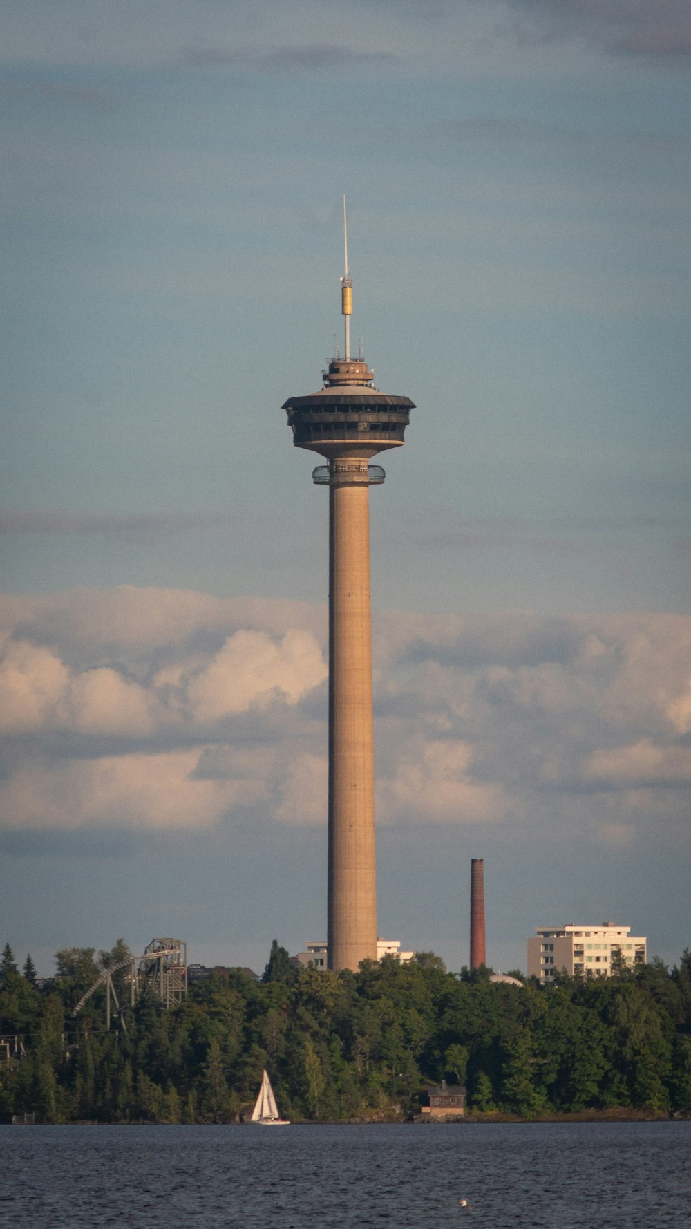 a tall tower sitting above a body of water