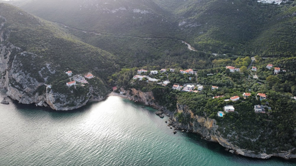 an aerial view of a small village on a cliff