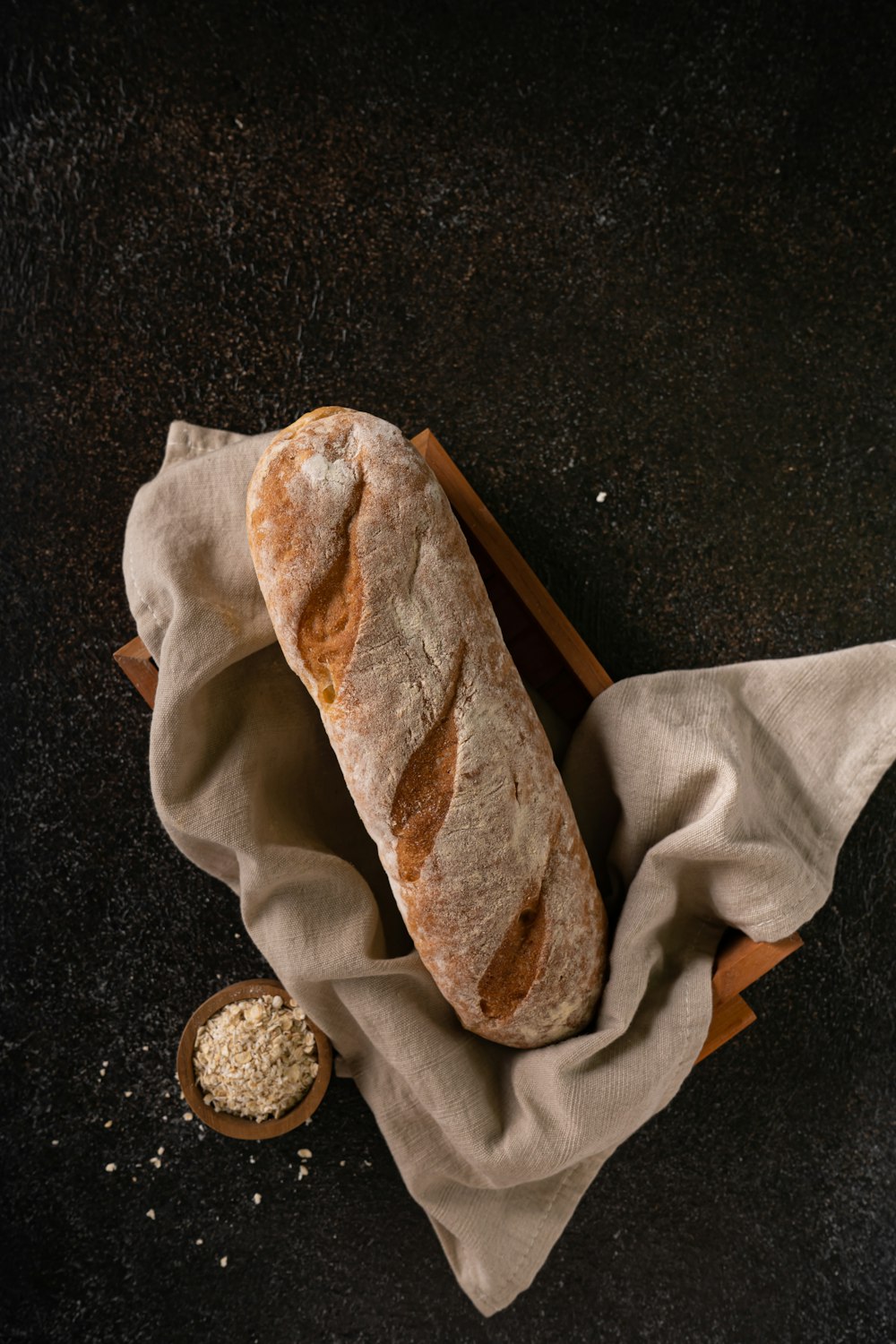 a loaf of bread sitting on top of a cloth