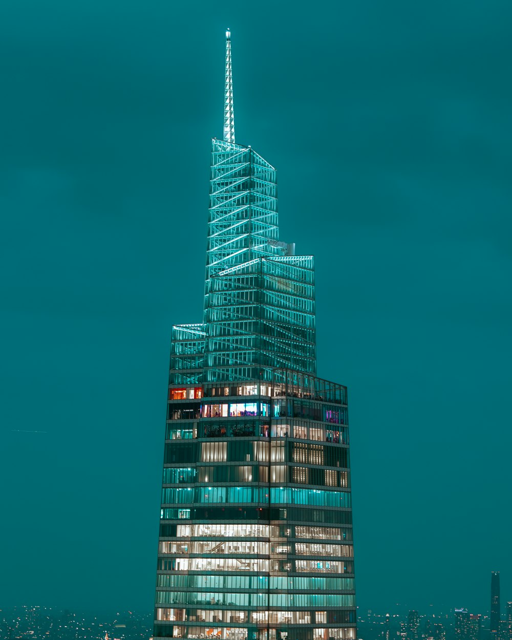 a very tall building lit up at night