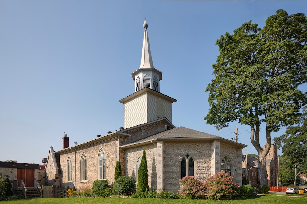 a church with a steeple and a steeple on top