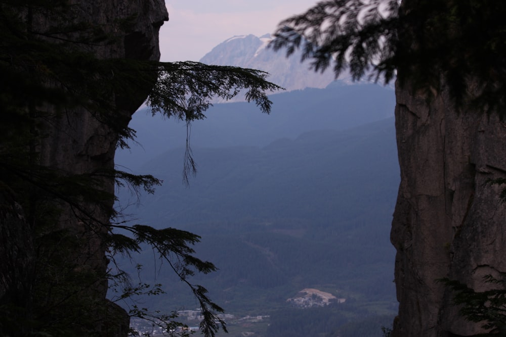 a view of the mountains from a cliff