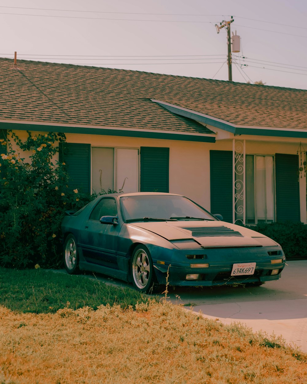 a car parked in front of a house