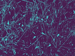 Abstract shot of overlapping geometric shapes in deep purple and charcoal with a grainy texture.