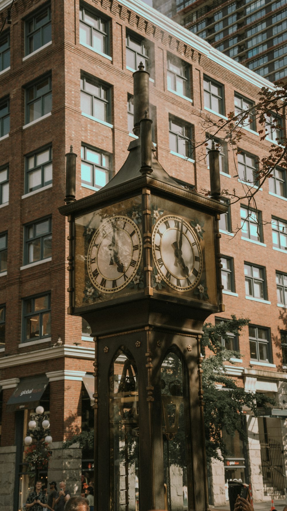 a clock tower in the middle of a city