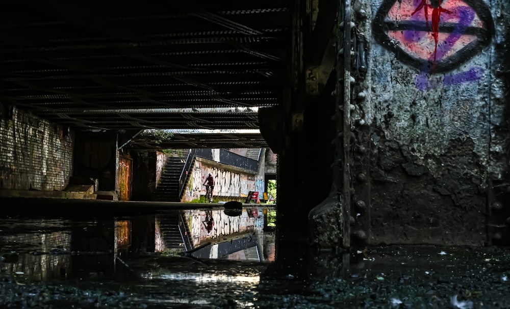 a picture of a building with graffiti on it