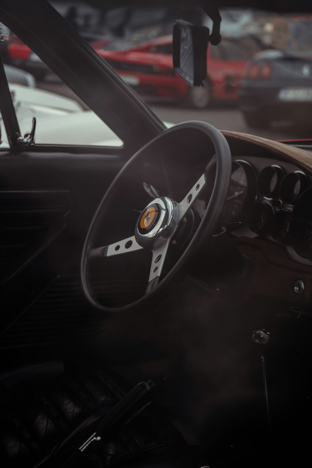 the interior of a car with a steering wheel