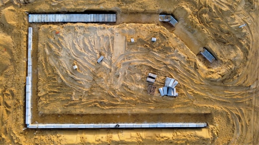 an aerial view of a construction site in the desert