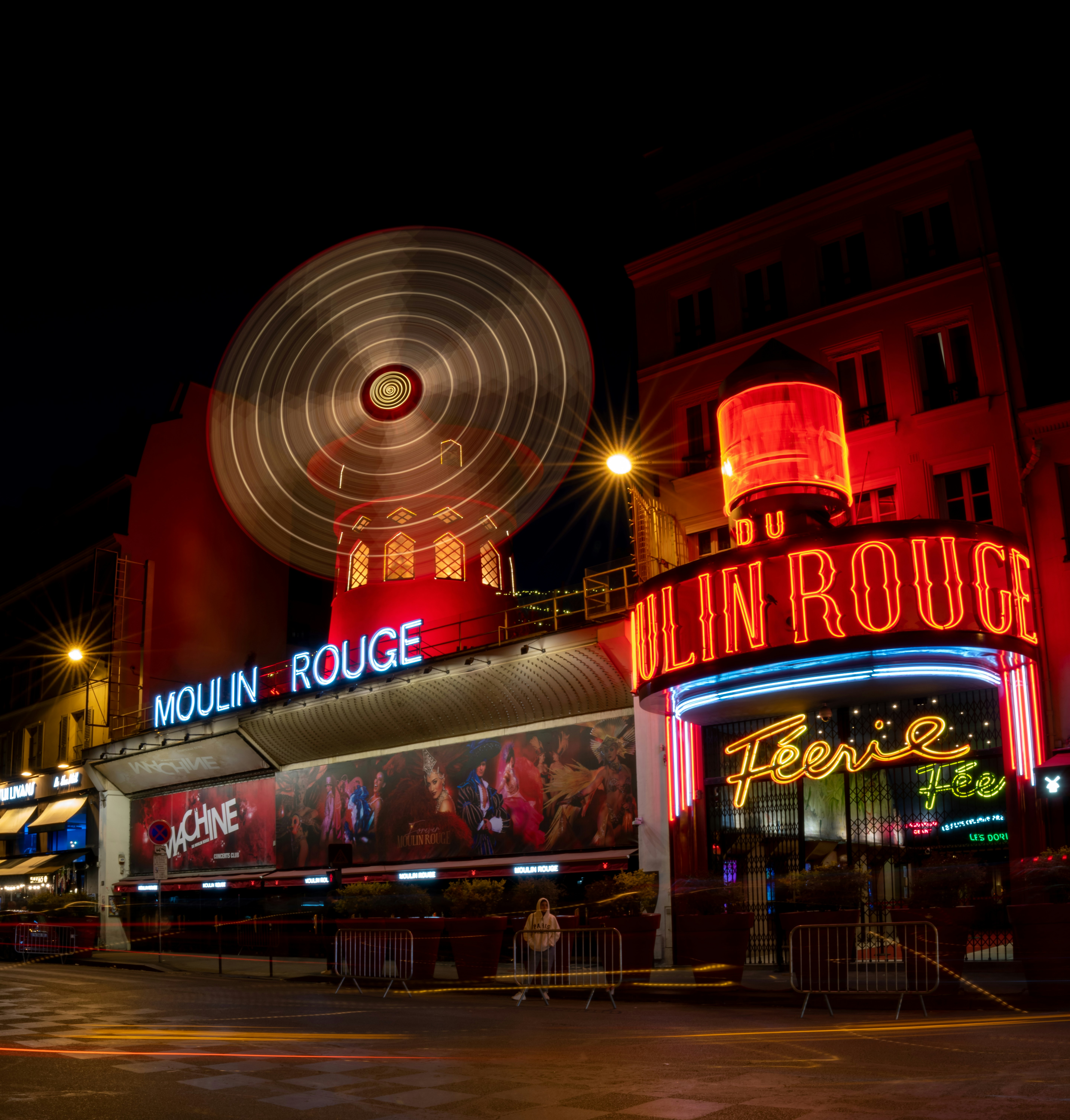 a large ferris wheel sitting on top of a building