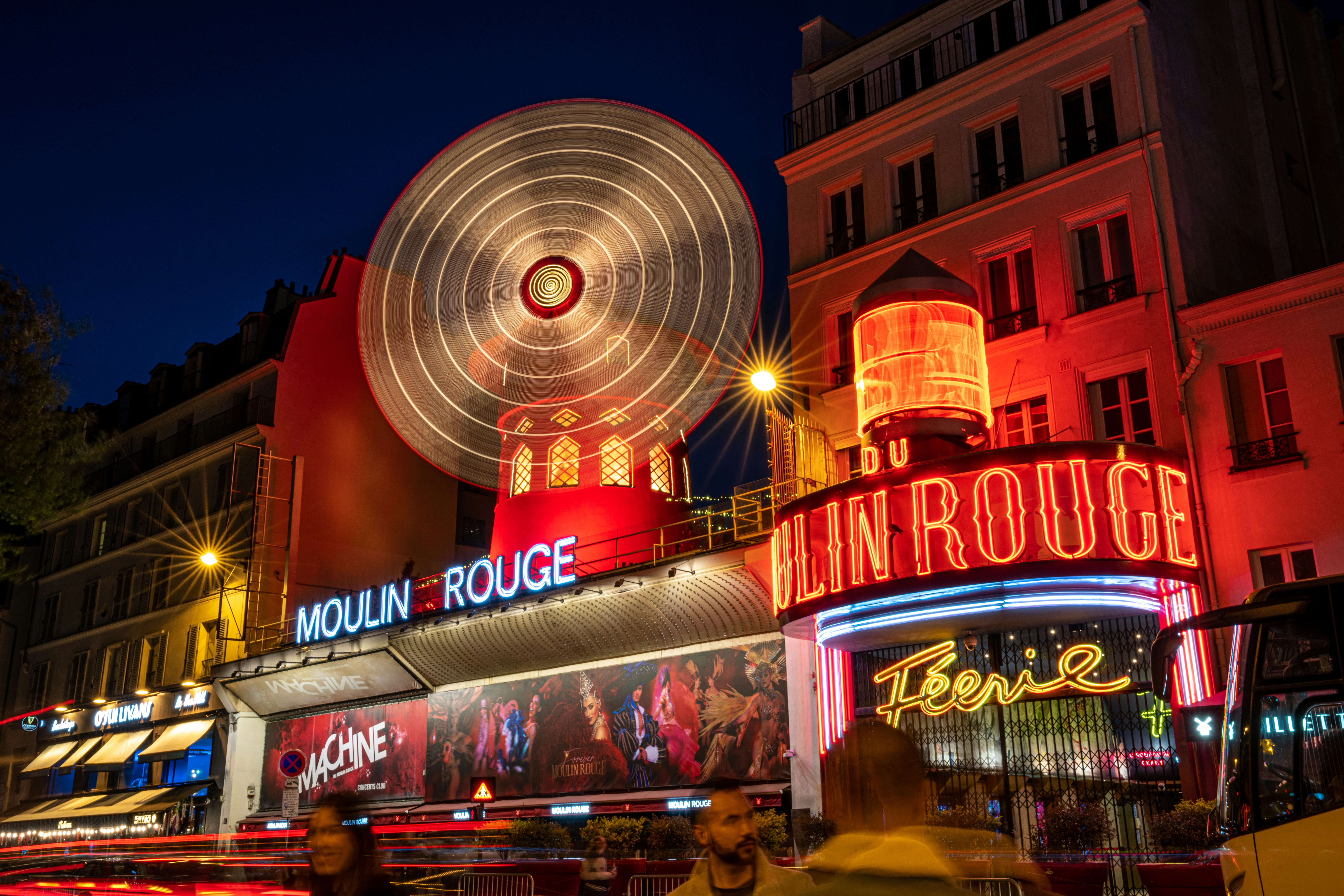 a large ferris wheel sitting on top of a building